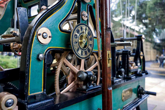 Photo of gears and inner workings of the clock.