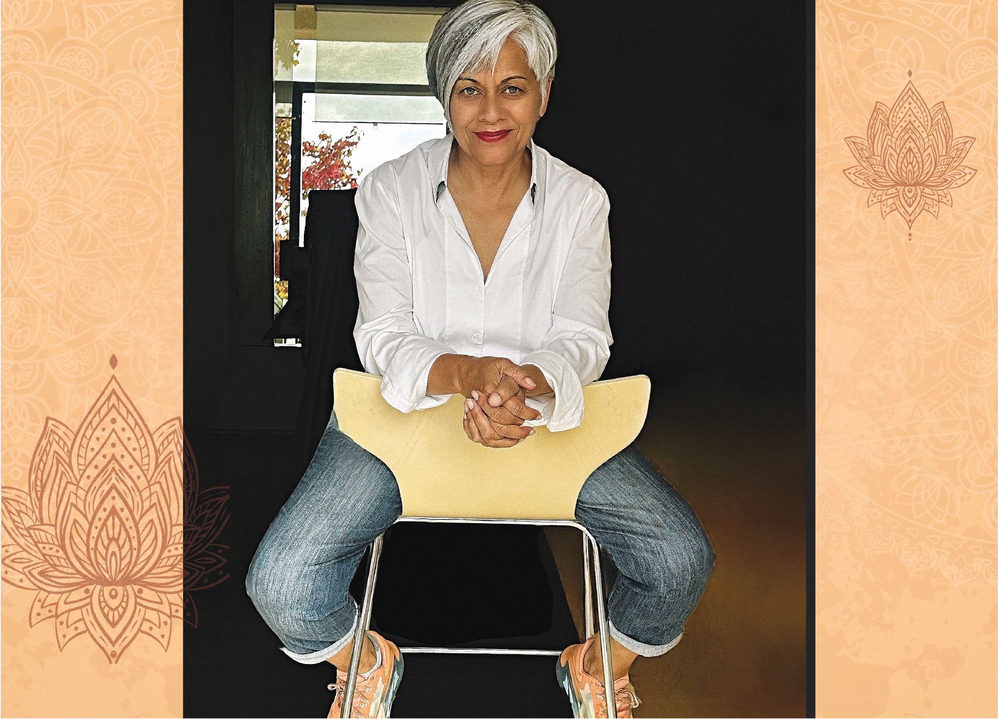 Alka Joshi sitting in a chair.
